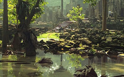 Pools around the temples at Angkor Wat, Cambodia bike tour. Unsplash@Melody Temple