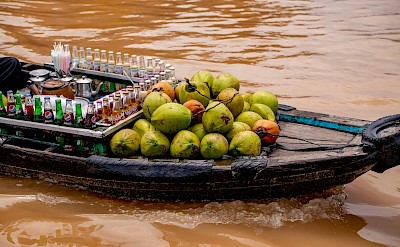 Riverboat stocked with coconuts and drinks. Pexels@Triduhi