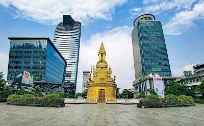 Temple in the city, Phnom Penh, Cambodia bike tour. Unsplash@Thoeun Ratana