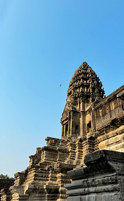 Top of a temple at Angkor Wat, Cambodia bike tour. Unsplash@Yannick Apollon