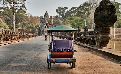 Tuk tuk to Angkor Wat, Cambodia bike tour. Unsplash@Norbert Braun