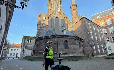 Cycling through a historic Dutch town square. ©Carla