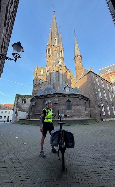 Cycling through a historic Dutch town square. ©Carla