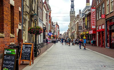 Strolling the charming streets of Alkmaar’s old town. Pexels@NikolaiKolosov