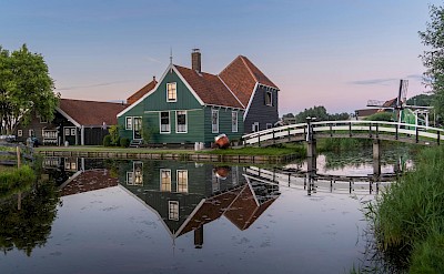 A peaceful canal and farmhouse at Zaanse Schans. Pexels@PierreBlache