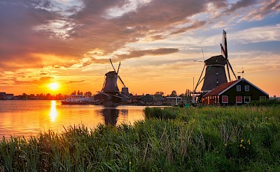 Sunset over the historic windmills of Zaanse Schans. unsplash@getty images