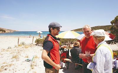 A relaxed beachside lunch with Sardinian sea views. toTN