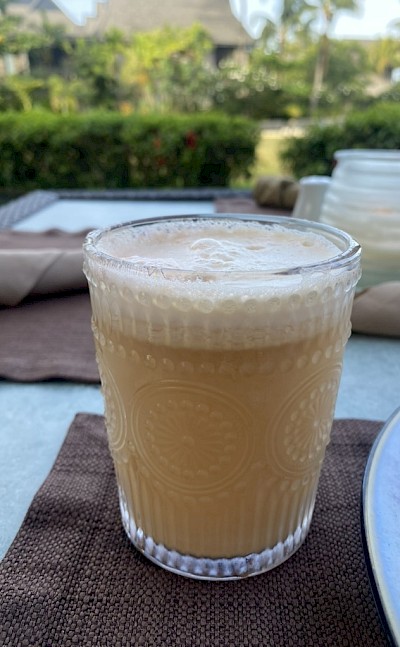 Morning coffee with peaceful tropical views. &copy;Mikky