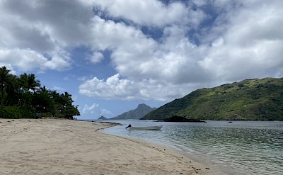 A peaceful, secluded beach cove in Fiji. &copy;Mikky