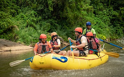 Whitewater rafting through Fiji&rsquo;s lush rainforest river canyon. to-FIT