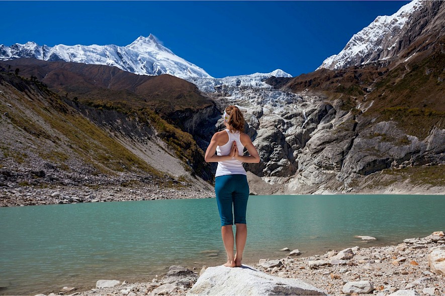 Yoga pose in the mountains. Unsplash@Getty Images