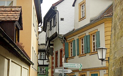 Historic streets of Bamberg with cobblestone lanes and colorful half-timbered houses in the old town. toSET