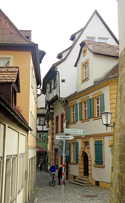 Historic streets of Bamberg with cobblestone lanes and colorful half-timbered houses in the old town. toSET
