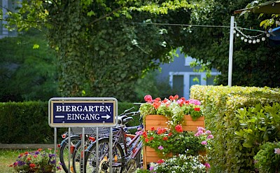 Traditional Biergarten, a classic German stop for cyclists along the Main. unsplash@SvenMieke