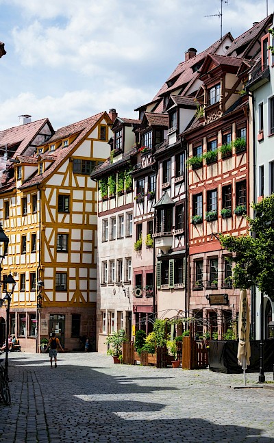 Colorful half-timbered houses along one of the city’s most picturesque old-town streets. Unsplash@MateoKrossler