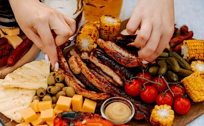 Biergarten-style meal. Unsplash@AaterynaHliznitsova