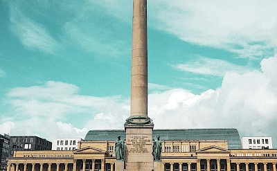 The majestic New Palace and Jubiläumssäule column of Stuttgart. Pexels@Alperengmssy