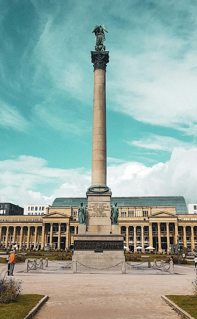 The majestic New Palace and Jubiläumssäule column of Stuttgart. Pexels@Alperengmssy
