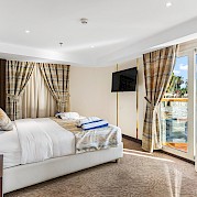 Owner Suite Bedroom | Nebu | Bike & Boat Tour