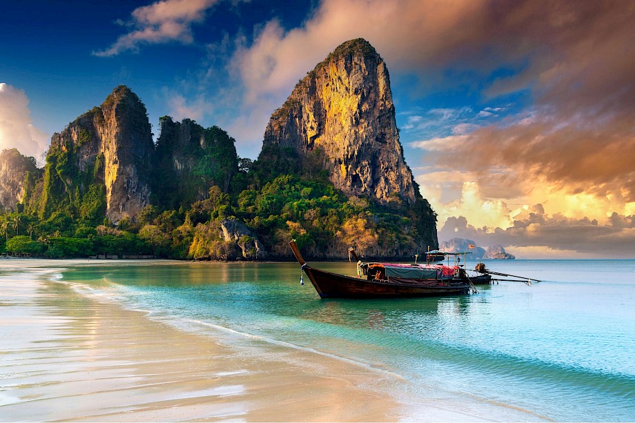 Boats at sunset in Thailand. Unsplash@Getty Images