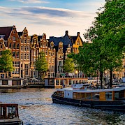 Amsterdam - Bruges - Paris - Classic canal houses in Amsterdam. pexels-paul-scheelen
