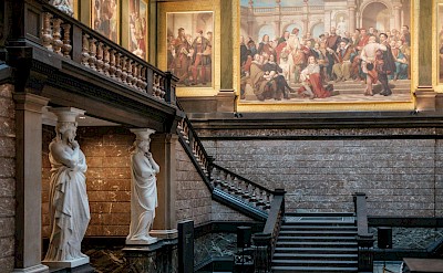 Staircase and Paintings in the Rubenshuis in Antwerp. pexels@Lauraparedis