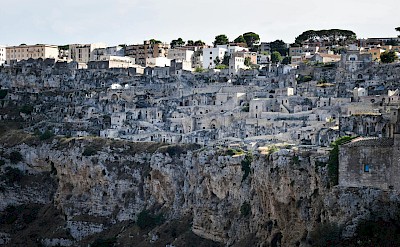 A panoramic view of the historic Sassi carved into the limestone cliffs in Matera. Pexels@AXPphotograghy