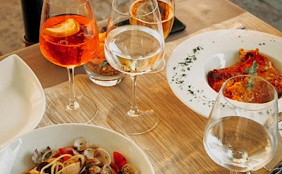 Classic pasta dishes paired with regional wines and aperitifs. unsplash@LiubovIlchuk