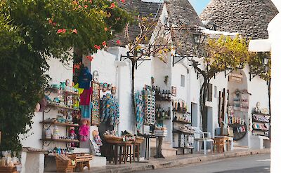 Shops in Alberobello, Puglia, Italy. Unsplash@Giulia Gasperini