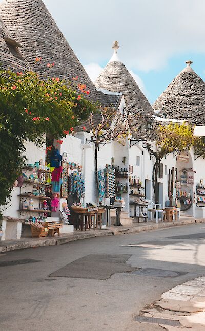Shops in Alberobello, Puglia, Italy. Unsplash@Giulia Gasperini