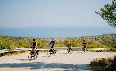 Cycling through classic Cycladic landscapes with open sea views. toIH