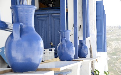 Traditional blue pottery and Cycladic architecture in Naxos, Greece. toIH