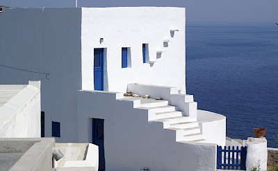 Classic whitewashed Cycladic architecture overlooking the Aegean. toIH