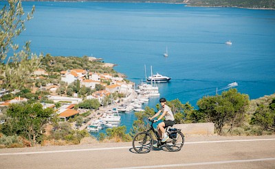 Cycling along the Aegean coastline on a Greek island bike and boat tour. toIH