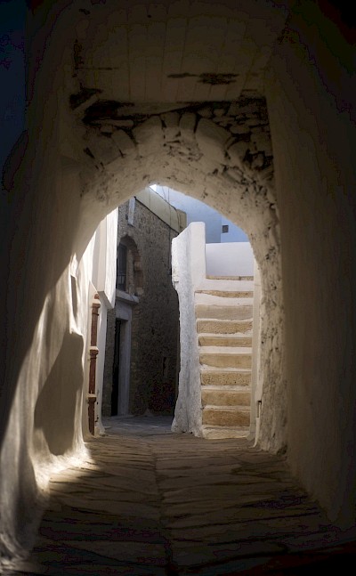 Historic stone passageway in the old town of Naxos. toIH