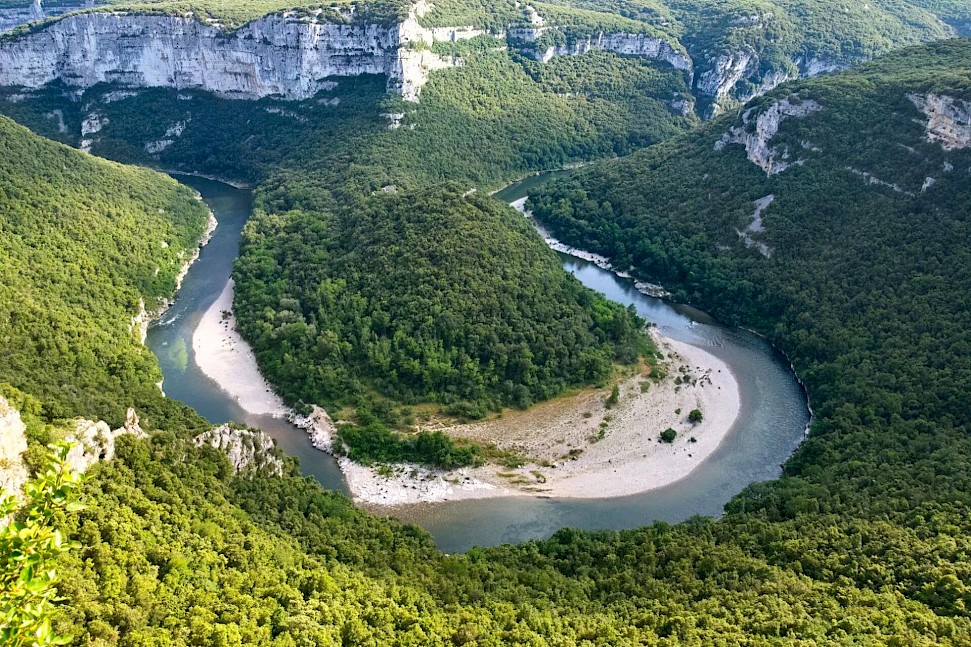 Bend in the river at the Ardeche Gorge. Unsplash@Zdenek Machacek