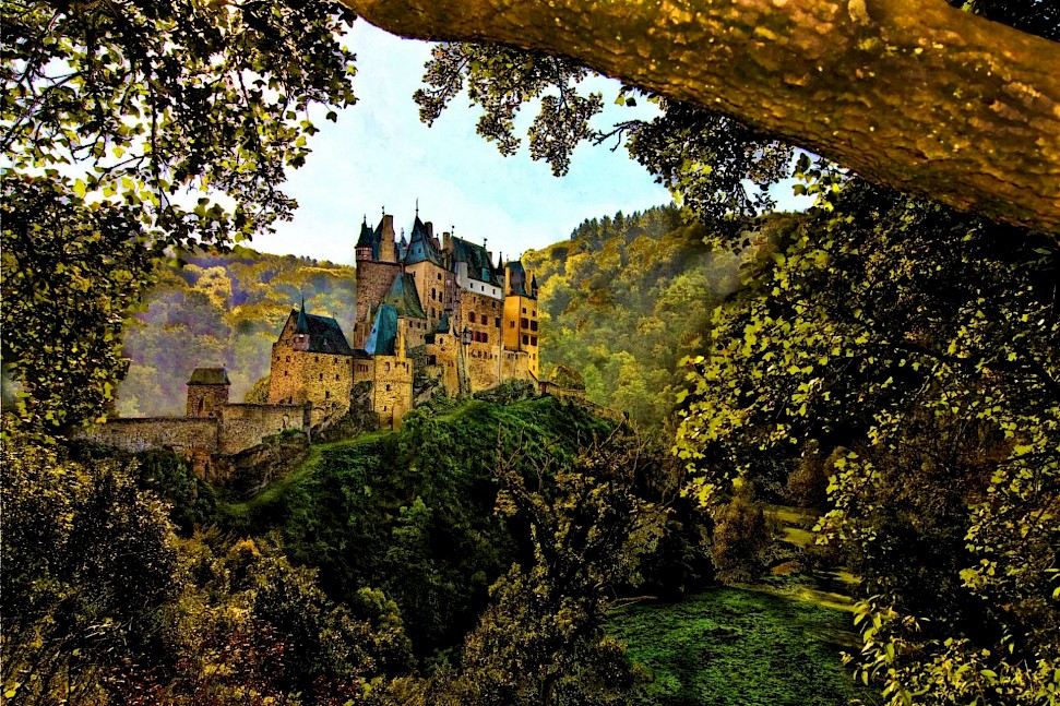 Eltz Castle surrounded by forest. Unsplash@Peter Justinger