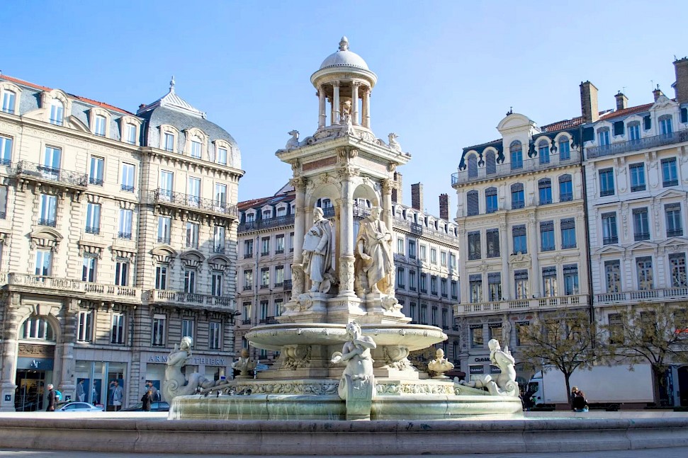Fountain in a square in Lyon. Unsplash@Diogo Nunes