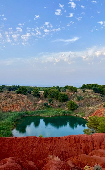 A former bauxite quarry lake near Otranto, now a natural oasis. unsplash@Luca