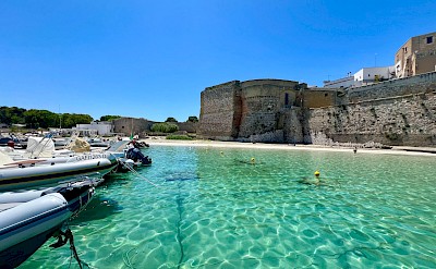 Turquoise waters beside Otranto&rsquo;s old town and medieval fortifications &copy;Heather