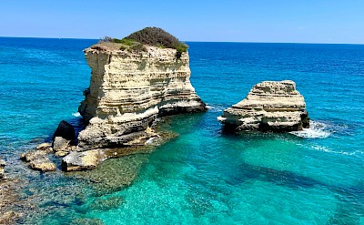 Dramatic rock formations rising from turquoise water near Otranto &copy;Heather