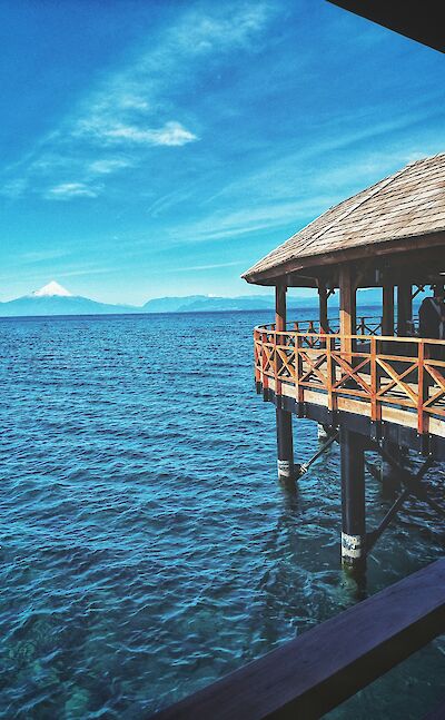 Lake Llanquihue with Osorno Volcano on the horizon. unsplash@JaimeSainteMarie