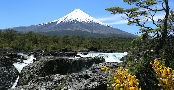 Osorno Volcano towering above the turquoise waters. Unsplash@MarcusDall