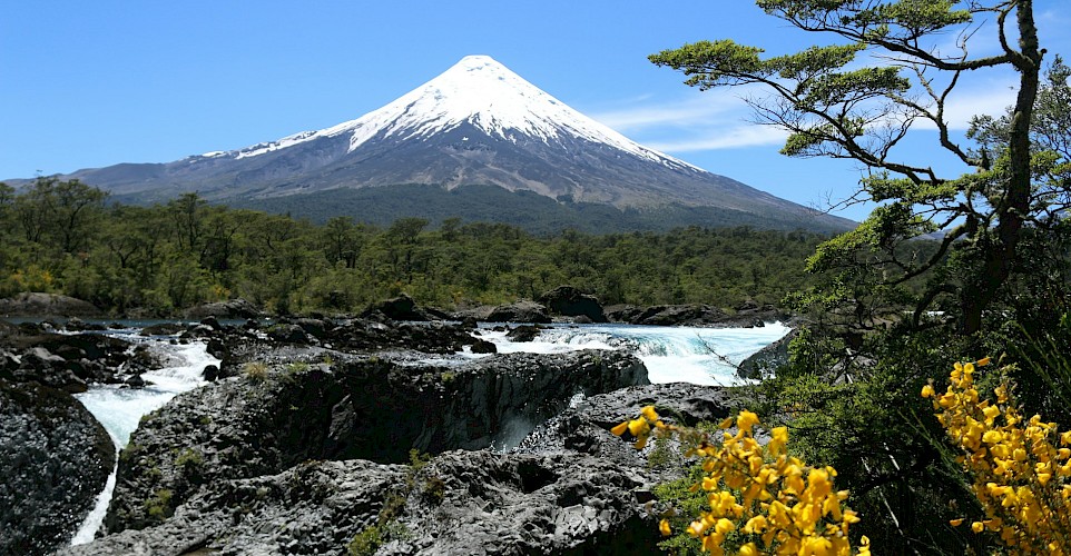 Osorno Volcano towering above the turquoise waters. Unsplash@MarcusDall