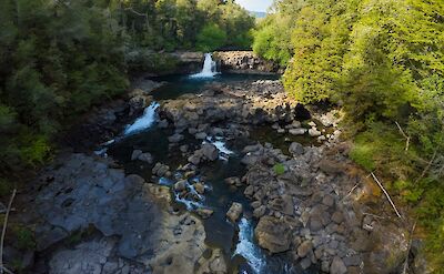 Waterfalls hidden in the forest near Lake Ranco. toAT