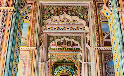 Colorfully painted palace corridor in Jaipur. Pexels@AXPphotography