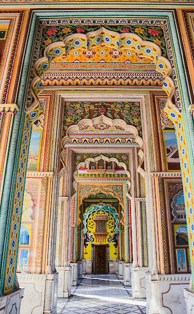 Colorfully painted palace corridor in Jaipur. Pexels@AXPphotography