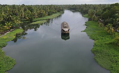 Traditional boat on a backwater canal. toIH