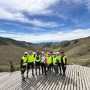 North Patagonia & Andean Lakes - Group photo and stunning lookout on Argentina to Chile bike tour. toAT