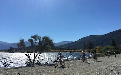 Lakeshore riding on Argentina to Chile bike tour. toAT